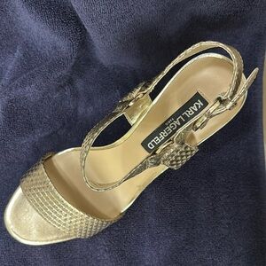 Gold stiletto strap around the ankle